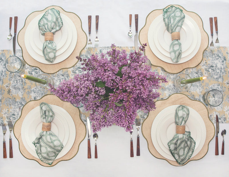 Rattan placemats and napkin rings are always a good idea