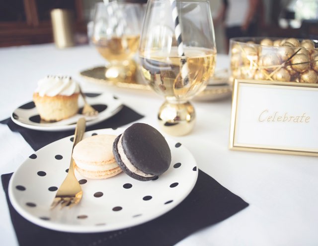 Cocktail party tabletop rental in black, white, and gold