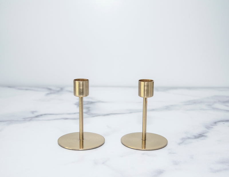 Rent pairs of gold candlesticks in various sizes