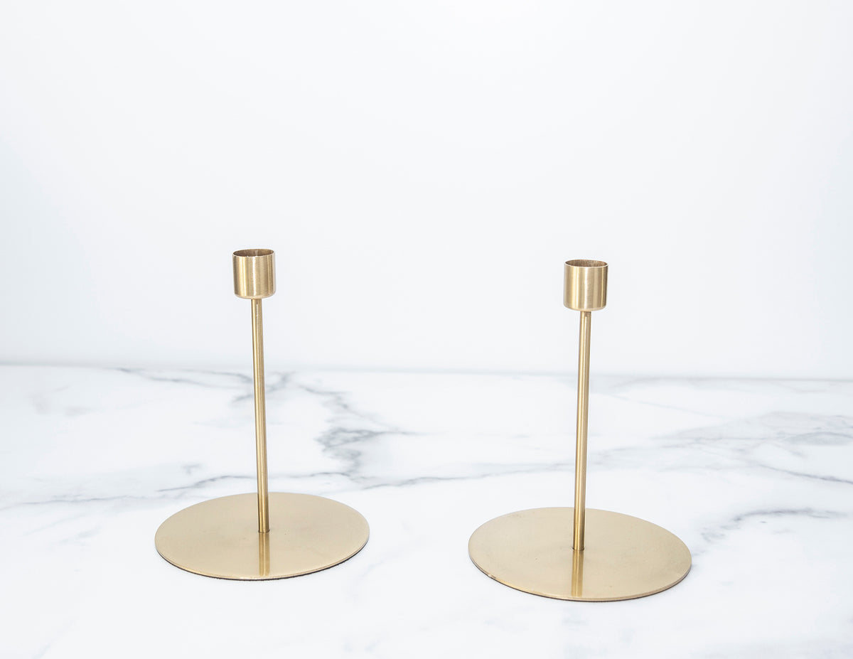 Add gold candlesticks to a tablescape