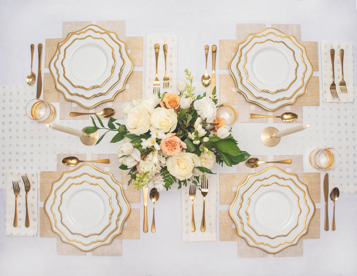 Table settings in gold work well for holidays, showers, weddings, and other occasions