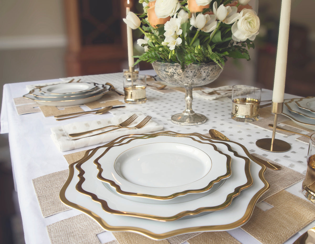 Gold dinnerware and flatware pair well for almost any event