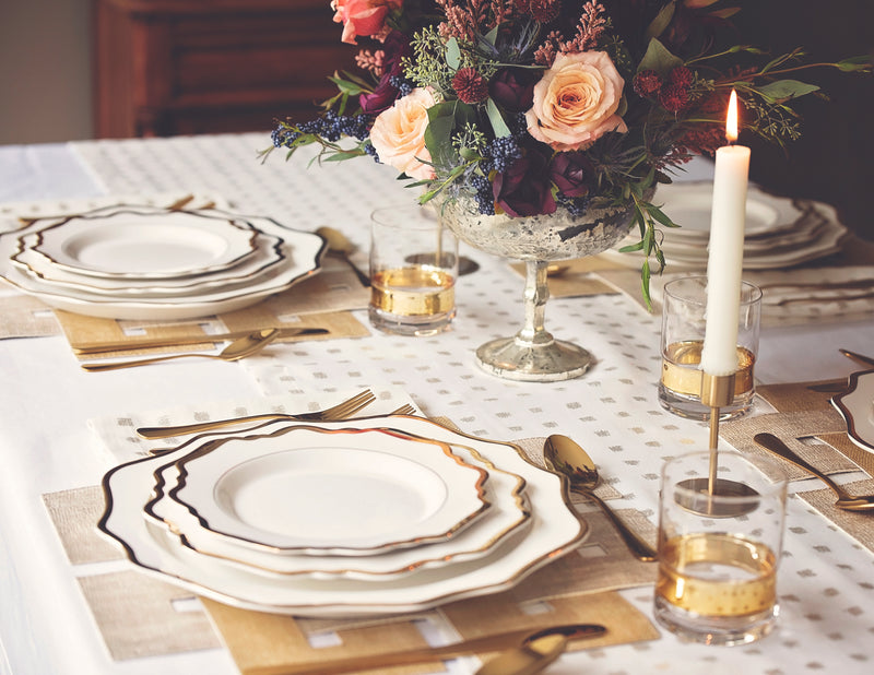 Gold dinnerware and flatware pair well for almost any event